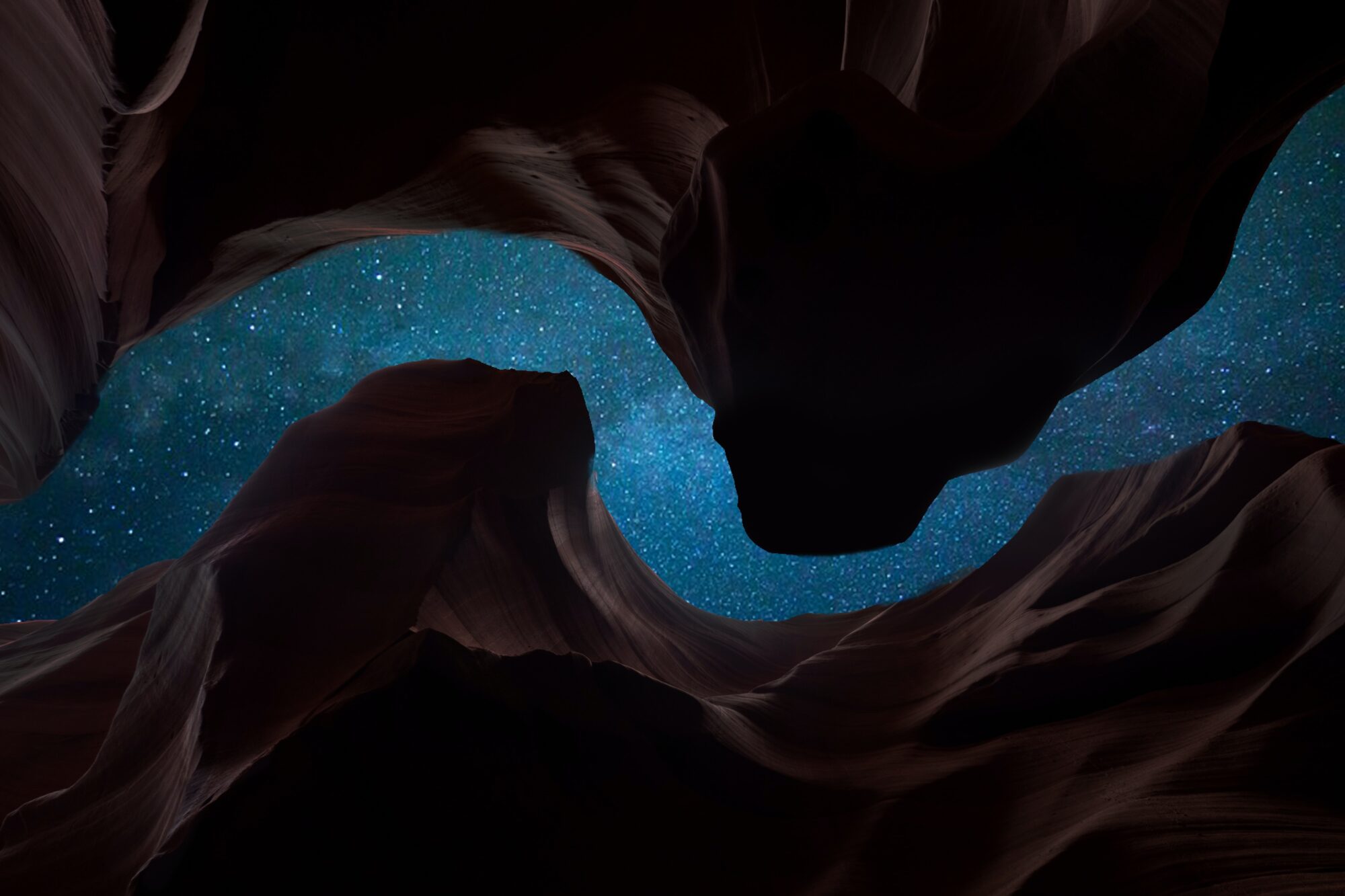 Nature image of looking up at the starry sky through a river shaped rocks' openning.