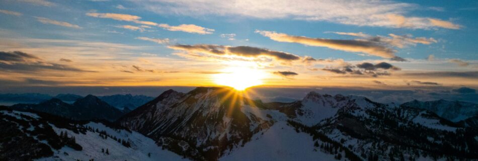 Sun rise over the snowy mountains